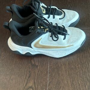 Nike Giannis Immortality Black, White, and Gold Basketball Shoes